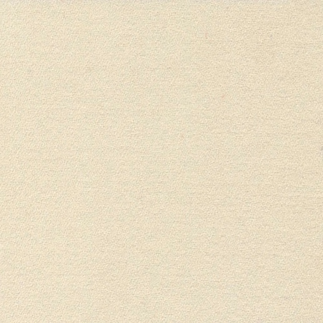 Close-up of soft ivory Marana crepe fabric with a fine pebbled texture