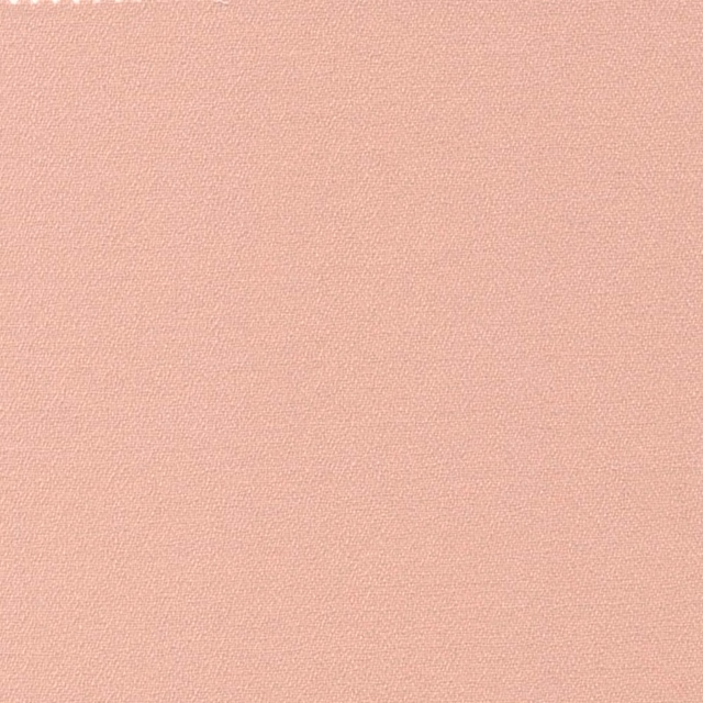 Pale warm buff crepe with a fine, softly pebbled woven texture