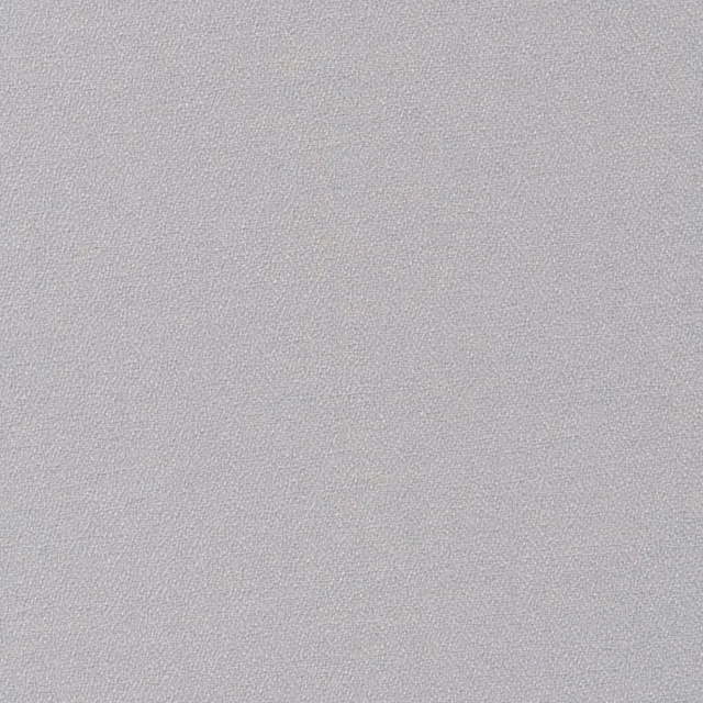 Pale dove-grey crepe fabric showing a fine, evenly pebbled woven texture