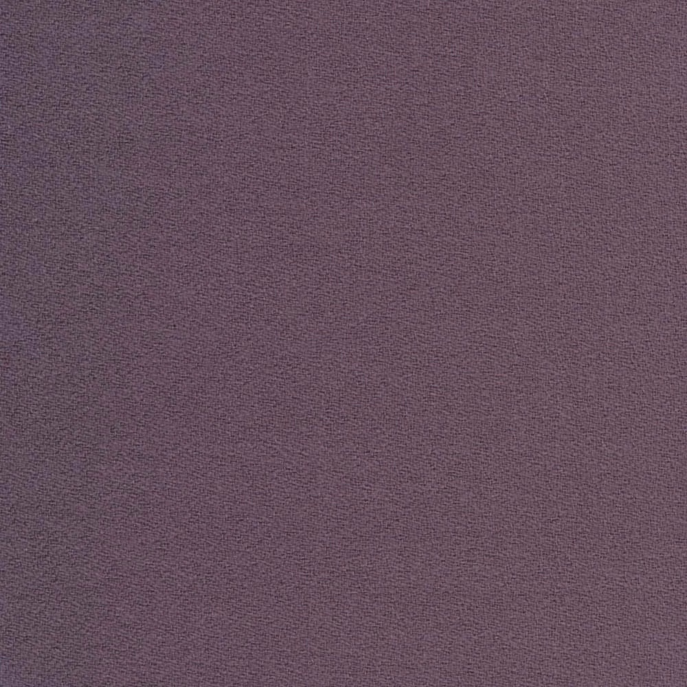 Close-up of muted grape-purple crepe with a fine, subtly pebbled texture