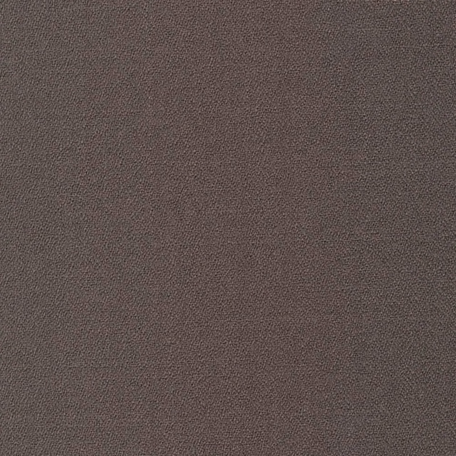 Close-up of dark graphite-grey crepe with a fine, softly pebbled weave