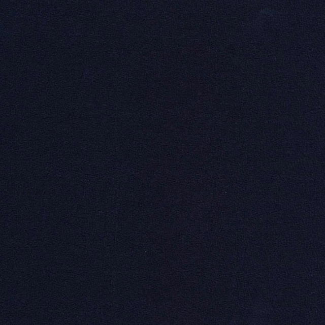 Near-black navy crepe with a fine, softly pebbled matte texture