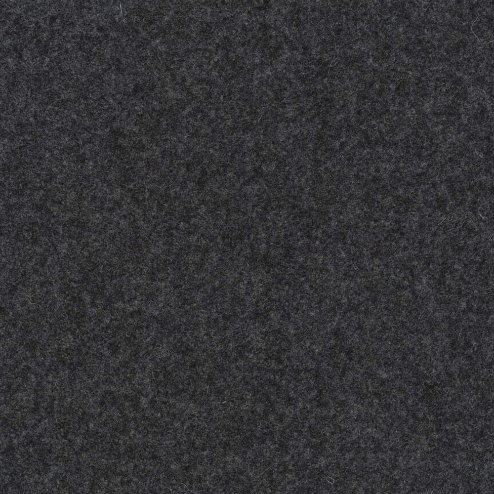 Close-up of deep charcoal-grey melton fabric with a dense, softly mottled nap