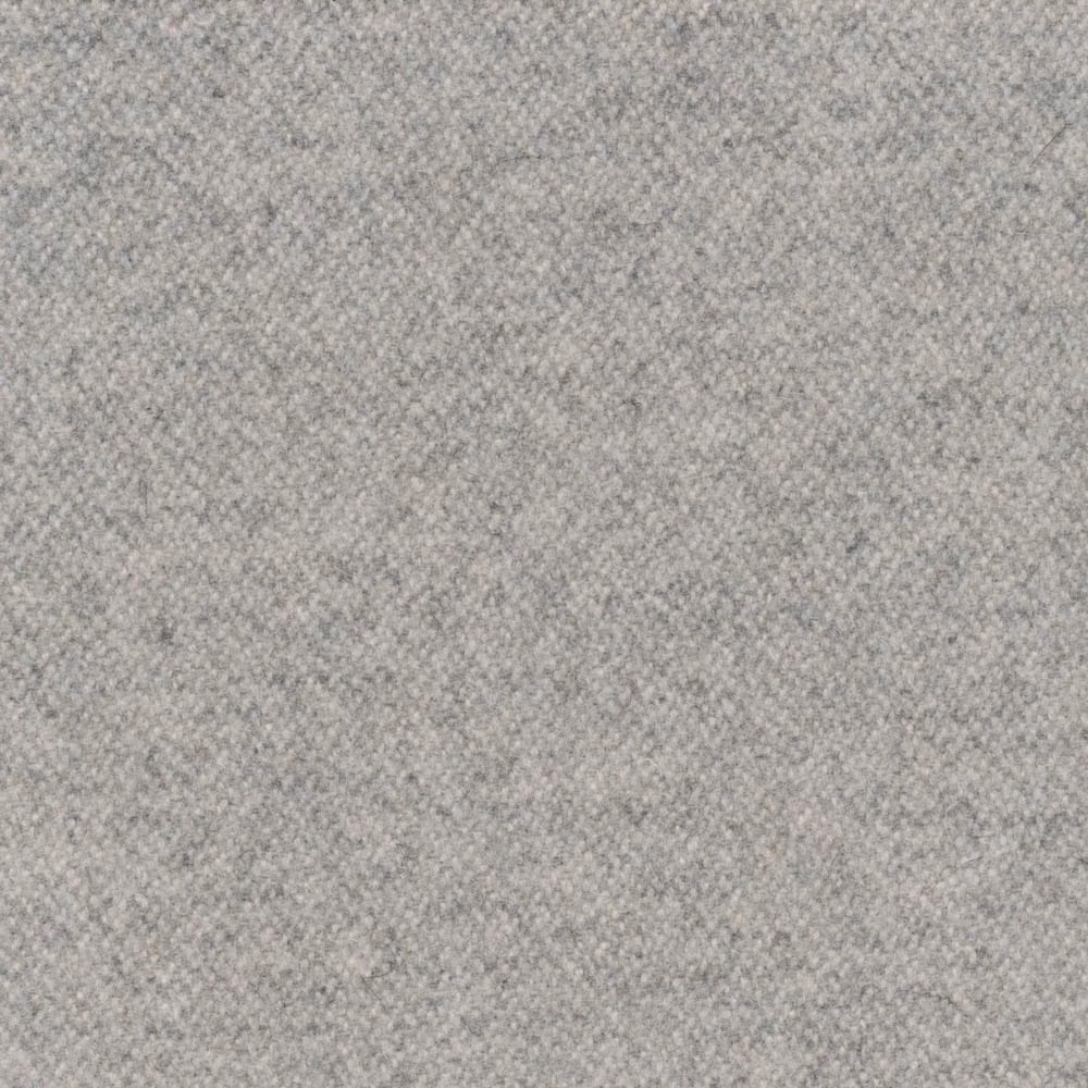 Close-up of dense dove-grey fabric with a softly mottled, finely textured surface