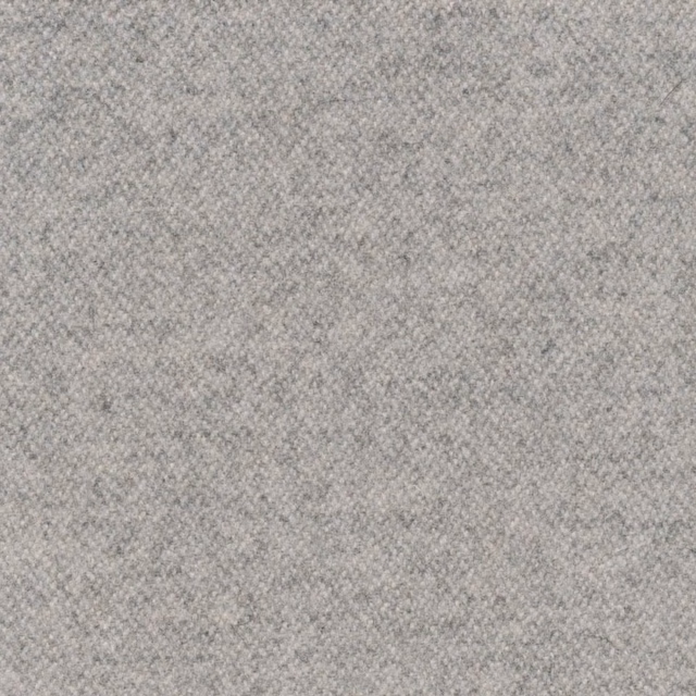 Close-up of dense dove-grey fabric with a softly mottled, finely textured surface
