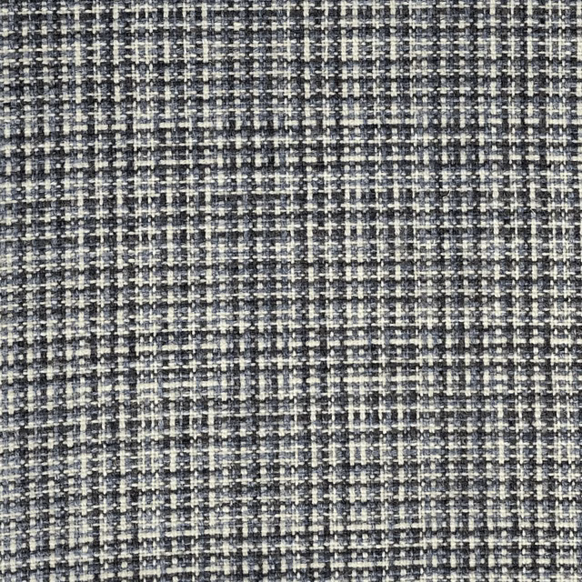 Charcoal blue-grey woven fabric with ivory flecks and a fine tweed-like texture