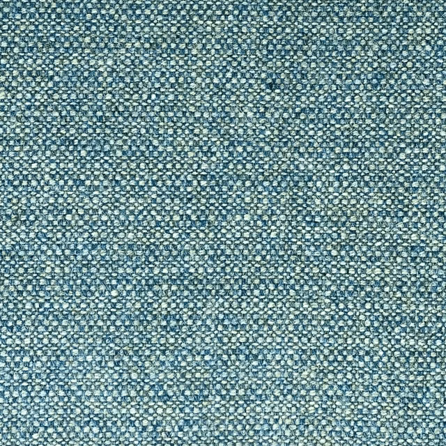 Close-up of muted teal woven fabric with tiny ivory flecks and nubby texture