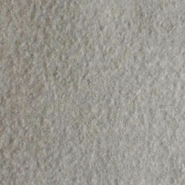 Pale ash-grey boucle with a dense, softly mottled nubby texture
