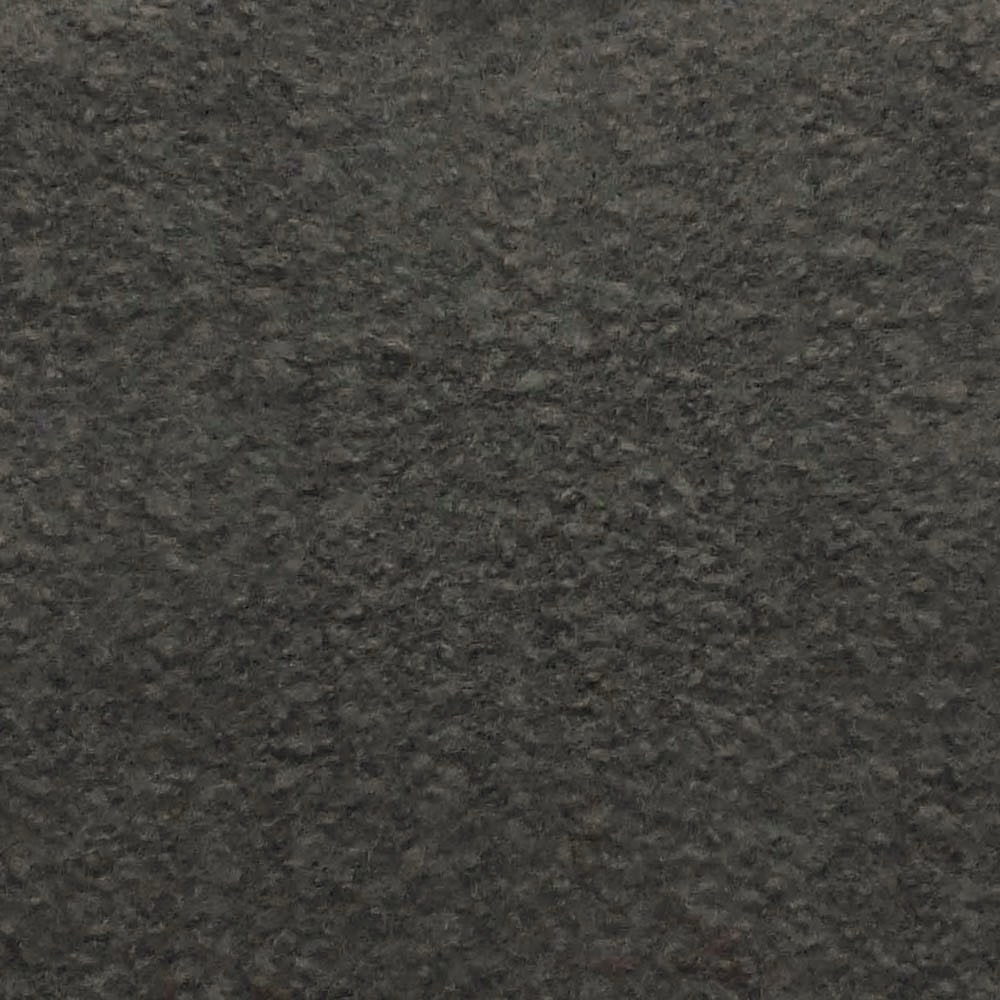 Dark charcoal-black bouclé with dense nubby loops and softly mottled texture