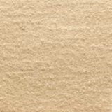 Warm champagne beige boucle with soft cream highlights and a fuzzy, flecked surface