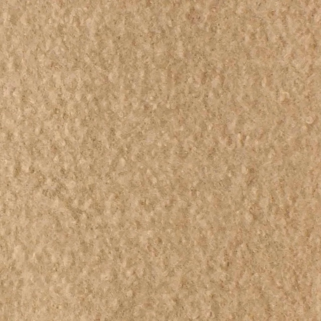 Warm oatmeal-cream boucle with softly mottled, irregular looped texture