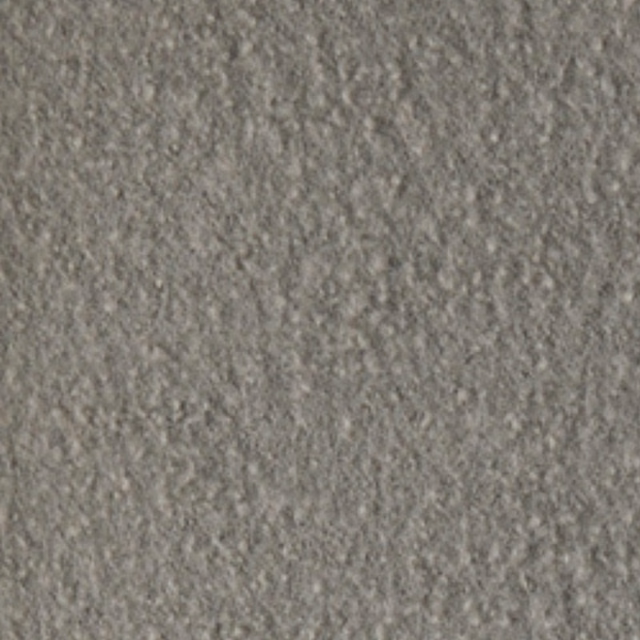 Close-up of grey-mink boucle with dense nubby loops and softly mottled texture