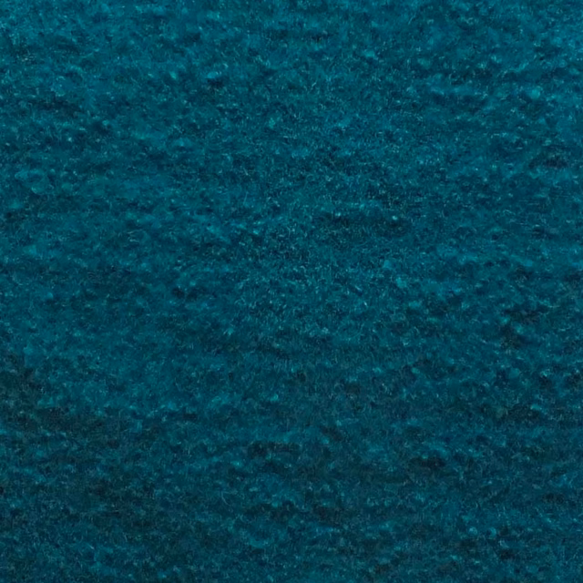 Deep ocean teal boucle with dense nubby loops and softly mottled darker fibres