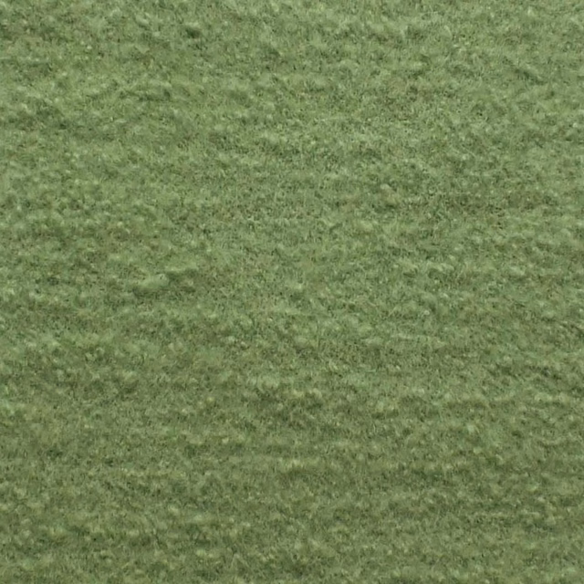 Mottled moss-green bouclé with a dense, softly brushed looped texture