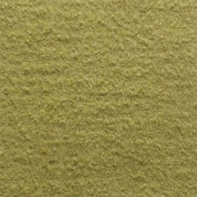 Close view of olive-wasabi bouclé with a softly mottled, nubby pile