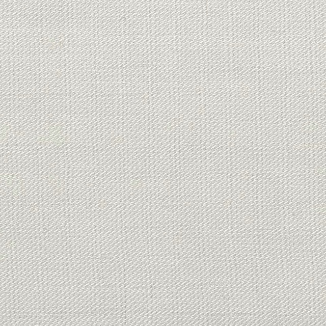 Close view of pale chalk ivory fabric with a fine diagonal woven texture