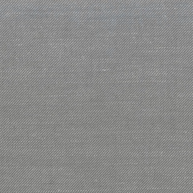 Close-up of cool lead-grey fabric with fine diagonal weave and subtle sheen
