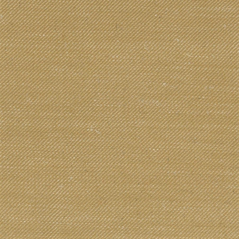 Warm pale-gold fabric showing a fine, tightly woven diagonal texture