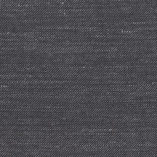 Dark soot-grey textile showing a fine, closely woven diagonal twill texture