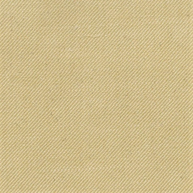 Warm wheat-beige fabric with a fine diagonal twill weave and softly varied texture