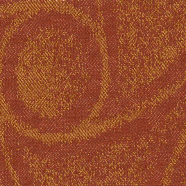 Dark amber woven textile with mustard-ochre organic rings and nubby flecked texture