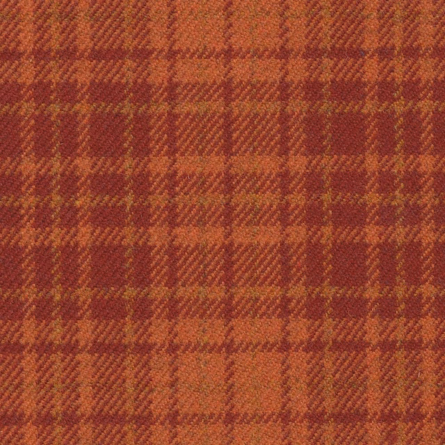 Dark amber and rust plaid with a dense, subtly ridged woven texture