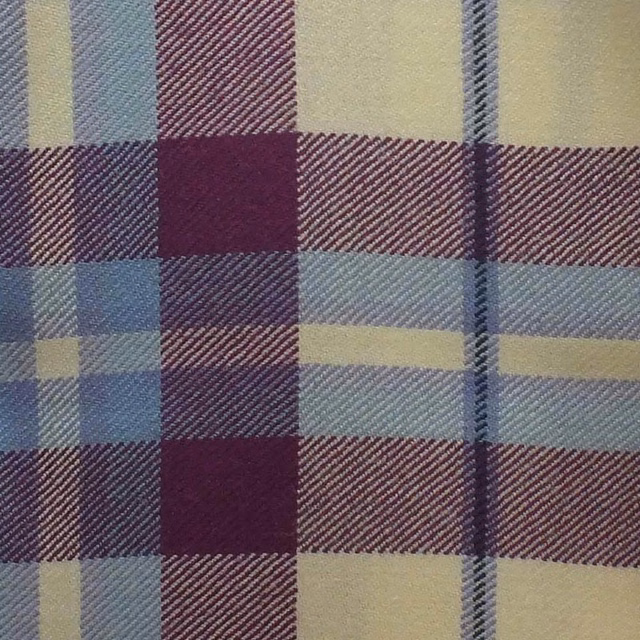 Deep magenta, dusty blue and cream plaid with a pronounced diagonal twill weave