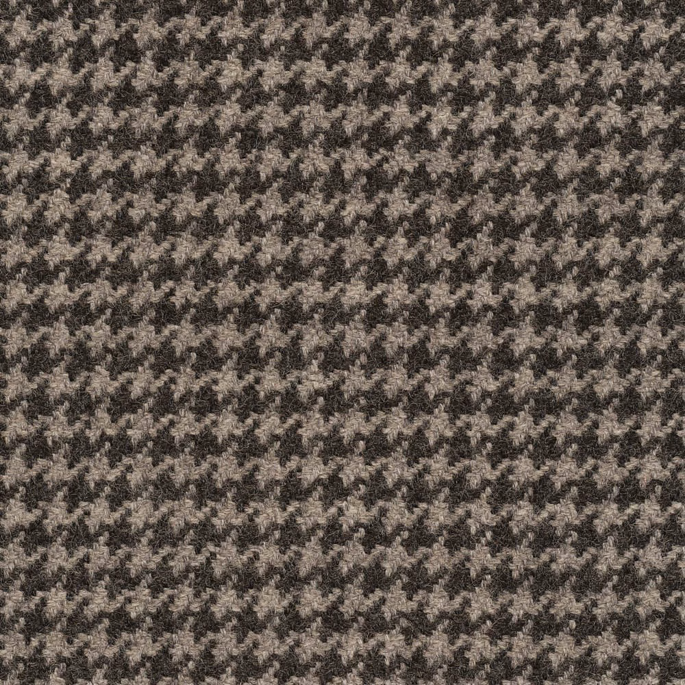 Close view of charcoal and grey broken houndstooth weave with softly flecked texture
