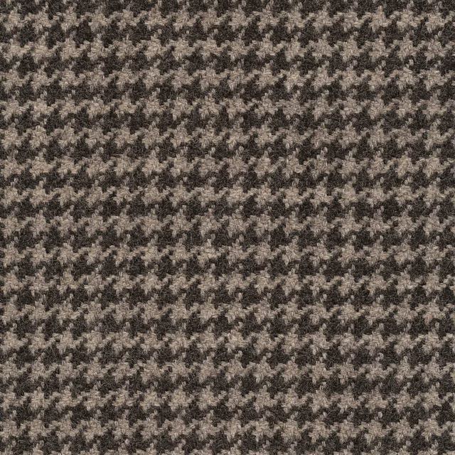 Close view of charcoal and grey broken houndstooth weave with softly flecked texture