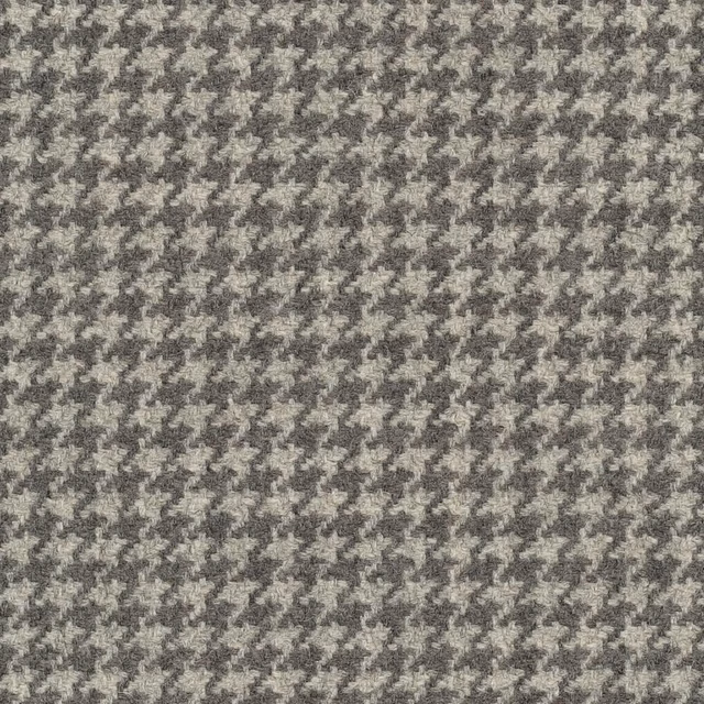 Cool steel-grey woven textile with a small broken-check pattern and mottled surface