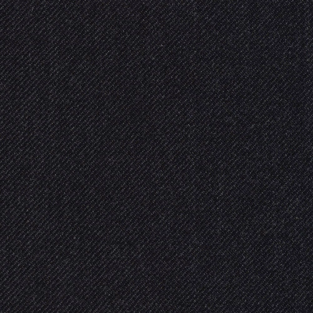 Near-black midnight-blue fabric with a fine, shadowed diagonal twill weave