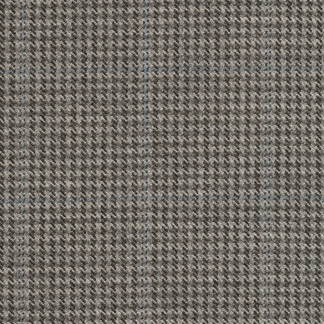 Close-up of steel-grey fabric with a fine charcoal and pale herringbone weave