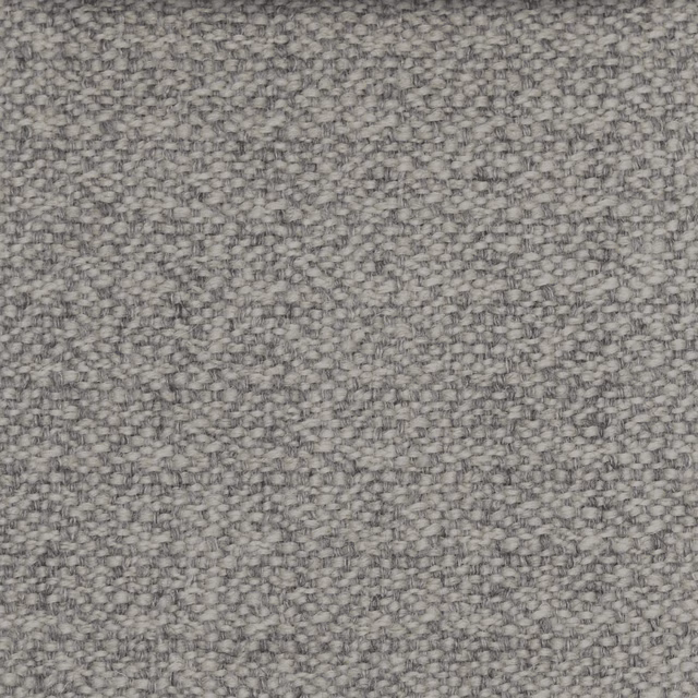 Close-up of mottled cool grey textile with a small-scale nubby woven texture