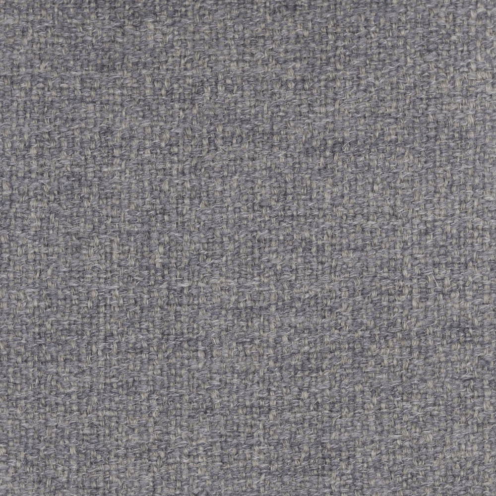 Close-up of cool grey, irregularly flecked woven fabric with a nubby surface