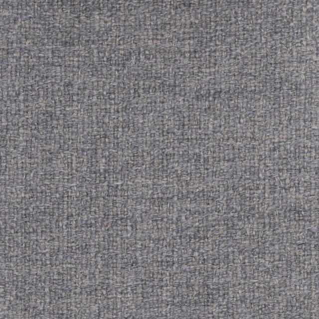 Close-up of cool grey, irregularly flecked woven fabric with a nubby surface