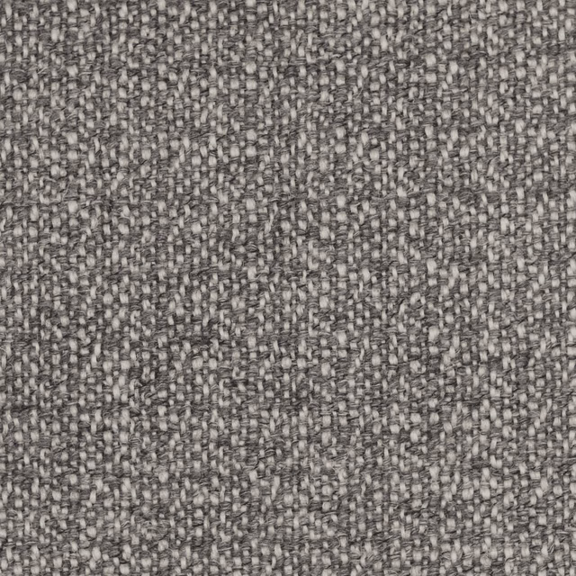 Close-up of charcoal grey upholstery weave with pale stone flecks and nubby texture