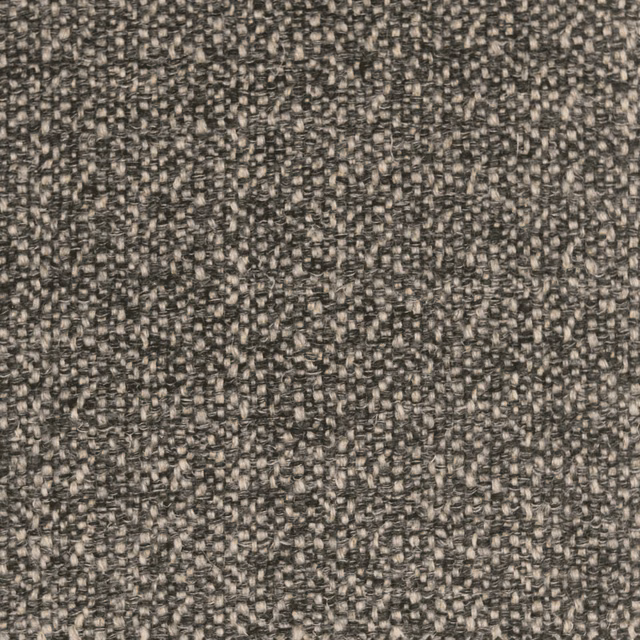 Close-up of slate-grey nubby weave with charcoal threads and pale stone flecks