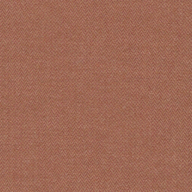 Close-up of muted russet terracotta fabric with a fine woven herringbone texture
