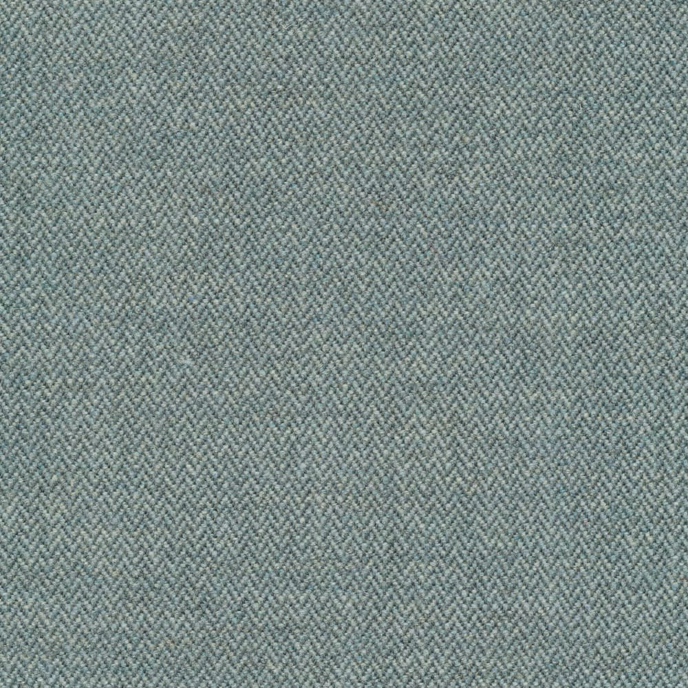 Muted blue-teal fabric with fine herringbone weave and warm topaz flecks