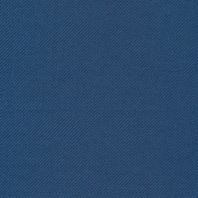 Close-up of deep cornflower-blue fabric with a fine diagonal twill texture