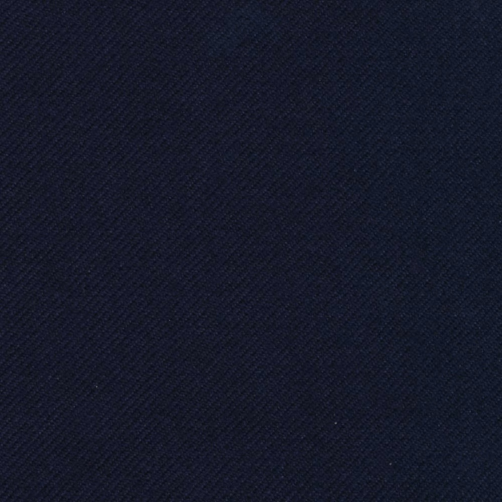 Deep indigo blue textile with a fine, even diagonal twill texture