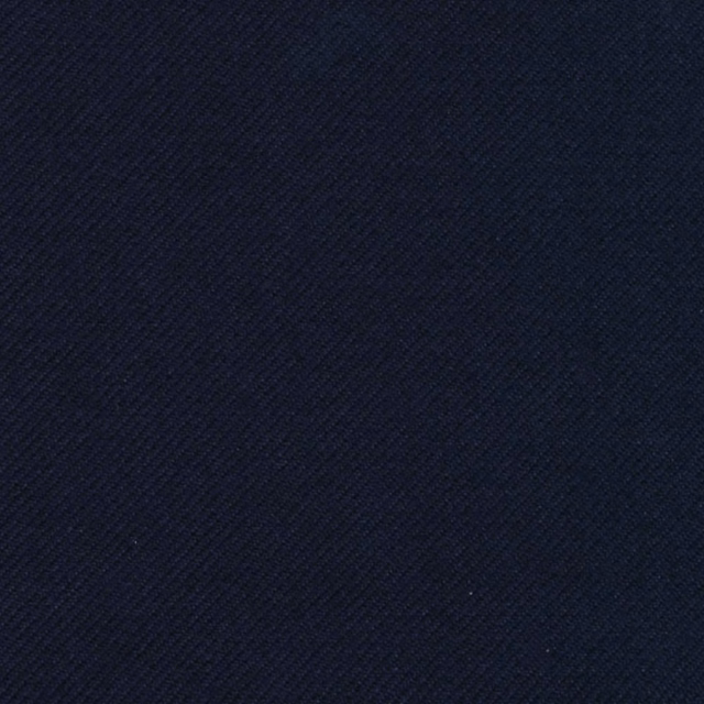 Deep indigo blue textile with a fine, even diagonal twill texture