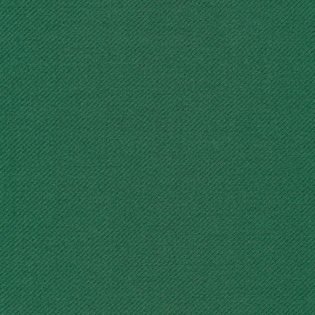 Close-up of deep cool green fabric with a fine diagonal twill weave