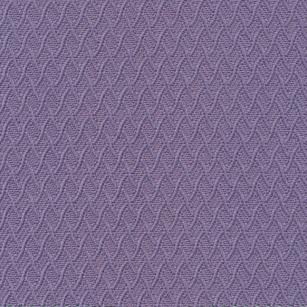 Close-up of light mauve woven fabric with raised interlocking wave lines