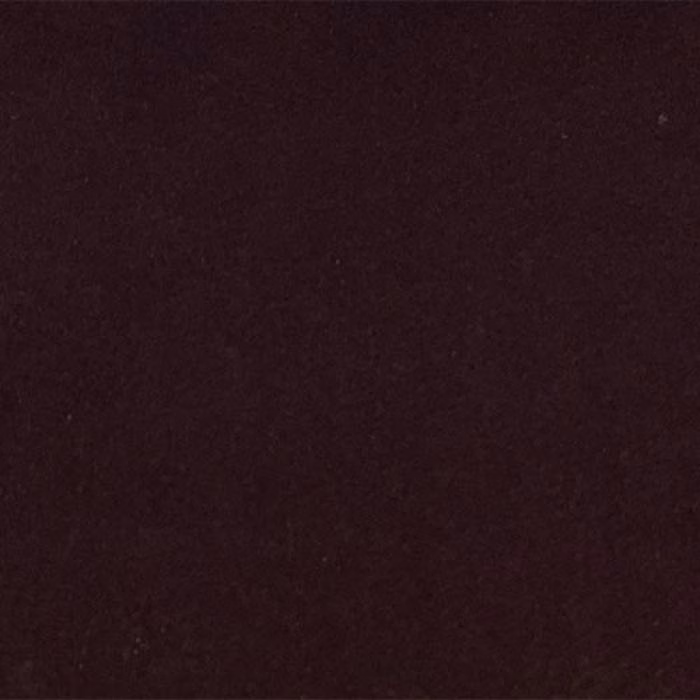 Close-up of a deep plum plain fabric swatch with a smooth, matte finish