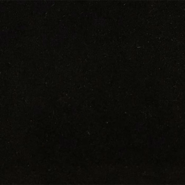 Deep matte black plain fabric swatch with a subtle soft texture