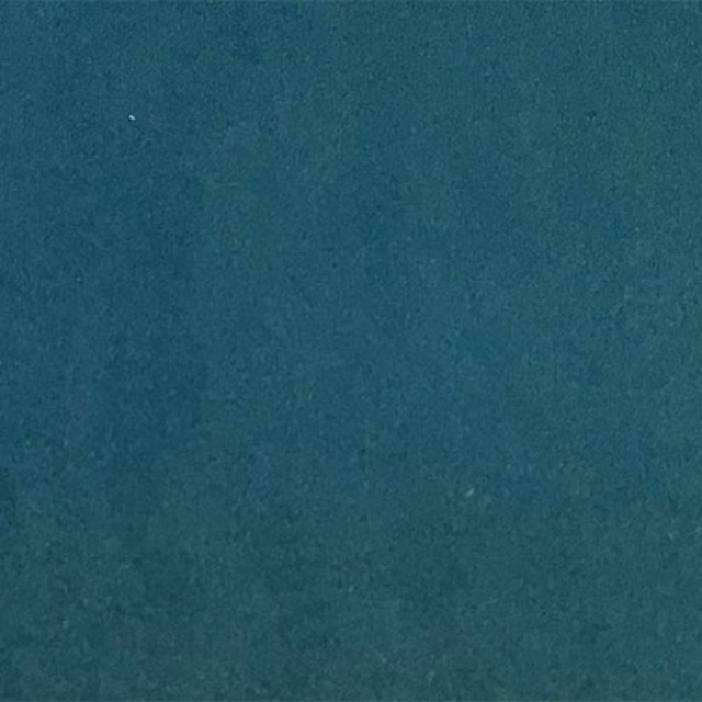 Deep teal plain fabric swatch with a soft matt finish