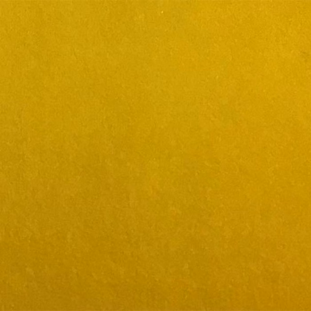 Close-up of plain buttercup yellow fabric with a smooth, soft-textured finish