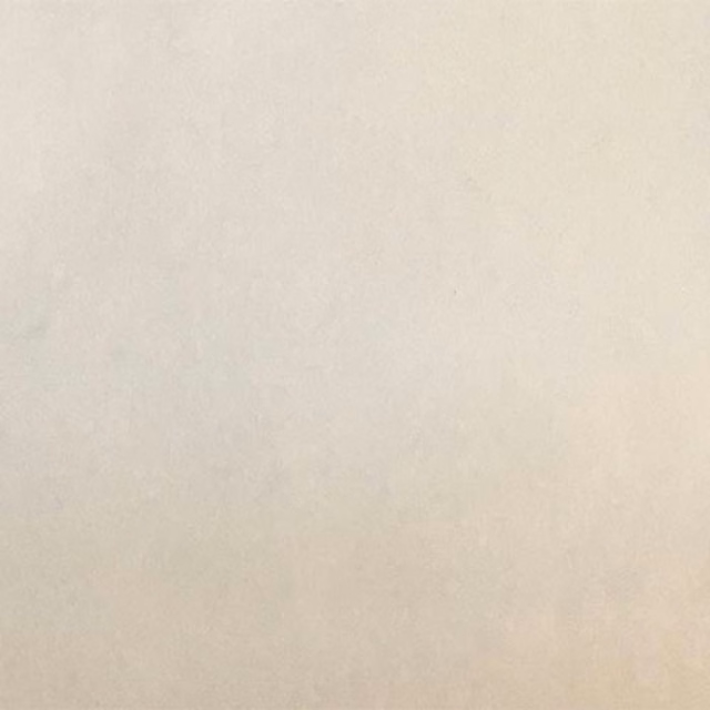 Soft ivory cream plain fabric swatch with a smooth matte finish