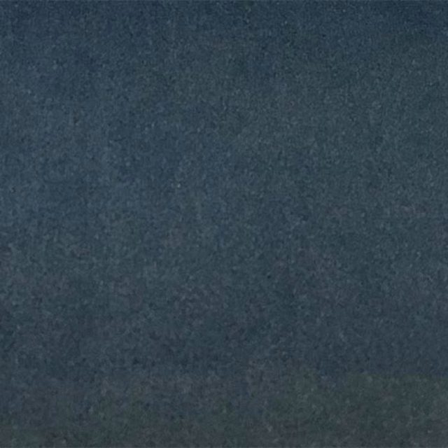 Deep cyan-blue plain fabric swatch with a soft, fine finish